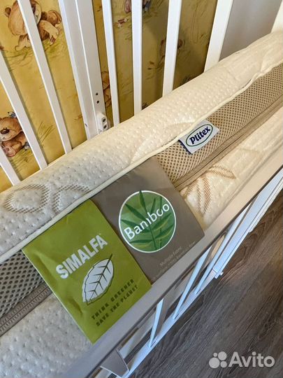 Детская кроватка с маятником