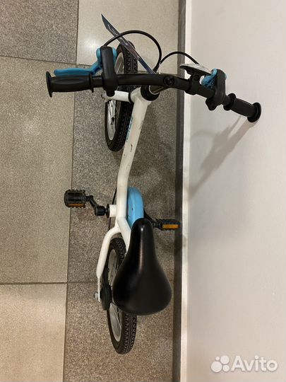 Велосипед btwin Dragon 14 с боковыми колесами