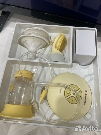 Молокоотсос medela электрический