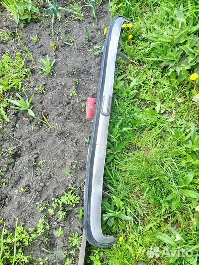 Задний бампер 21011