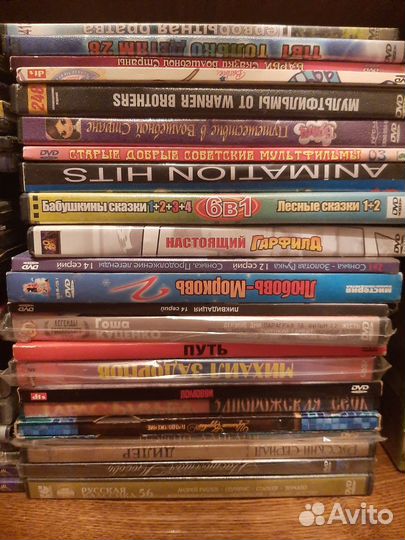 DVD диски с фильмами, музыкой, мультфильмами