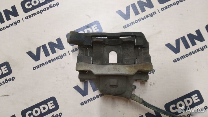 Суппорт тормозной передний левый Renault Scenic