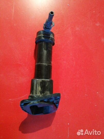 Форсунка омывателя фар передняя левая Nissan