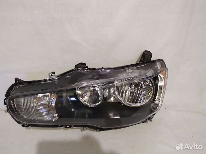 Фара левая Lancer X