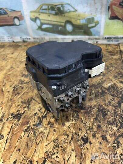 Блок ABS Мицубиси L200 4пок