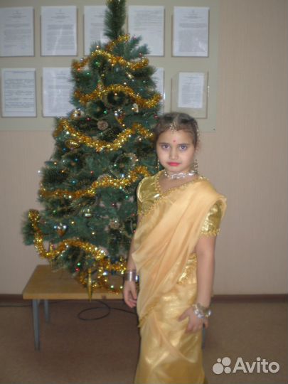 Новогодние костюмы и платья