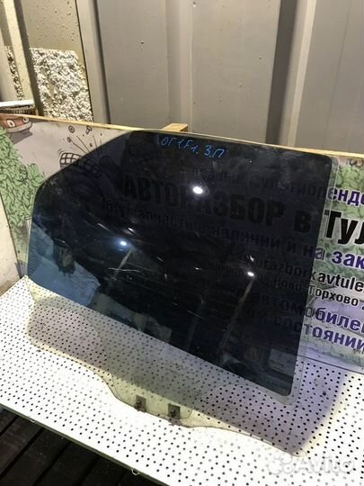 Стекло двери заднее правое Renault Logan