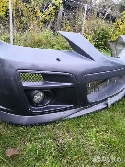 Бампер передний Мазда 3 бк седан