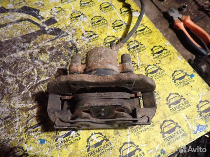 Суппорт тормозной передний правый Ford Focus 2