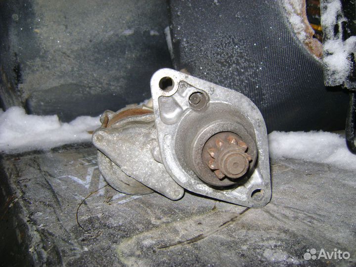 Стартер Субару 23300AA220 Subaru Denso 128000-8311