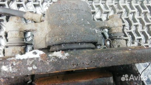 Суппорт тормозной задний левый KIA sorento 2 (CAD0