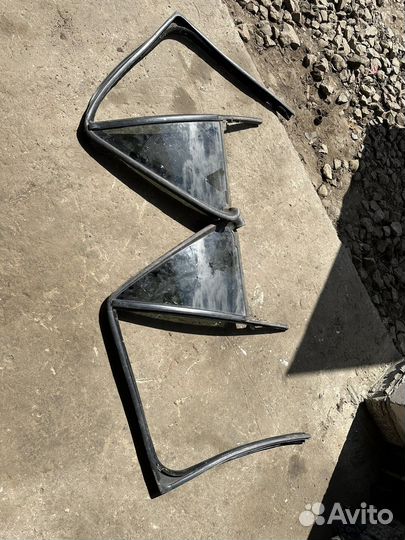 Cadillac srx стекло задней двери