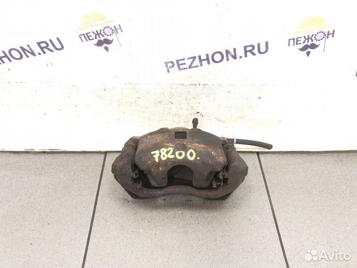 Суппорт тормозной передний левый Mitsubishi Lancer