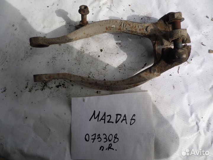 Кронштейн амортизатора (передний правый) Mazda Maz