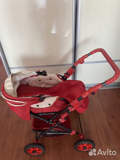 Игрушечная коляска для кукол