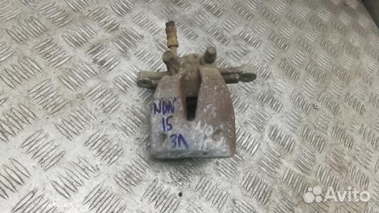 Суппорт тормозной задний левый toyota avensis T25