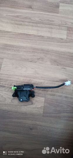 Замок багажника geely atlas