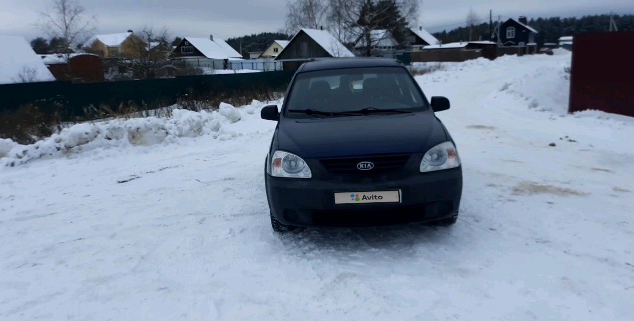 Kia Carens: фото владельца