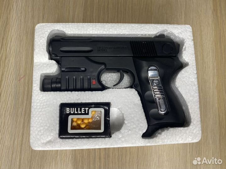 Игрушечный пистолет