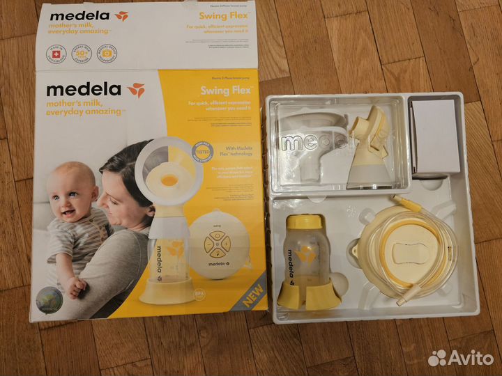 Молокоотсос medela электрический
