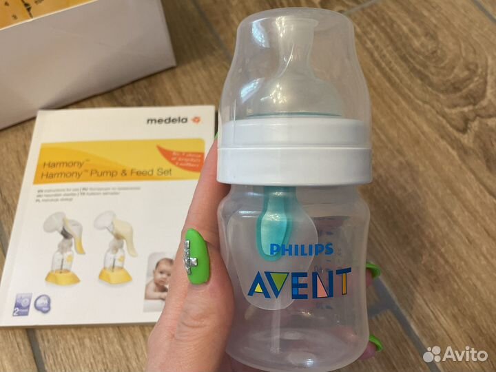 Молокоотсос medela ручной с бутылочкой