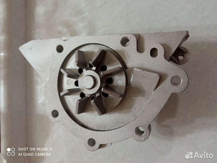 Насос водяной(помпа) на пежо 406