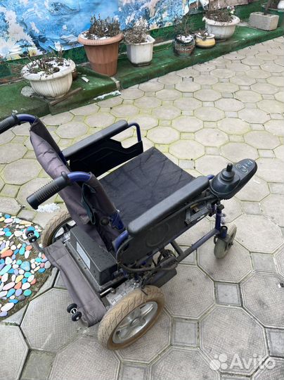 Коляска инвалидная на электротяге