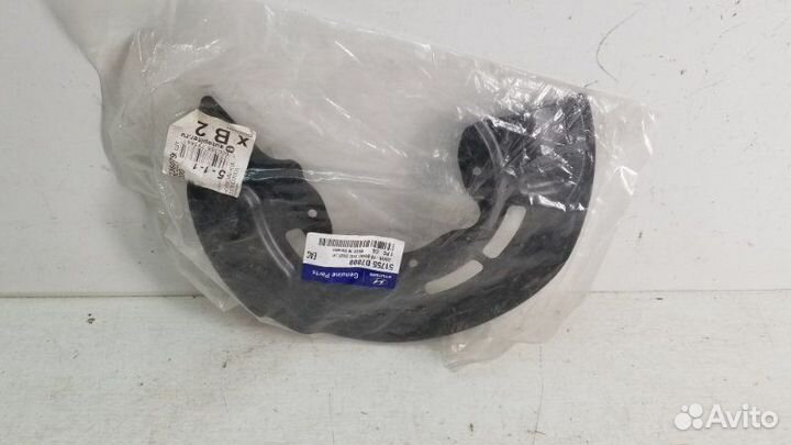 Пыльник тормозного диска левый Kia Sportage 4