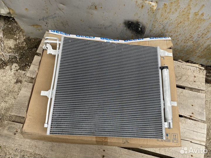 Радиатор кондиционера Geely Atlas