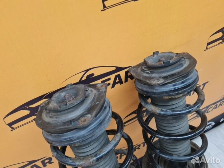 Амортизатор передний Nissan Qashqai J10 HR16DE