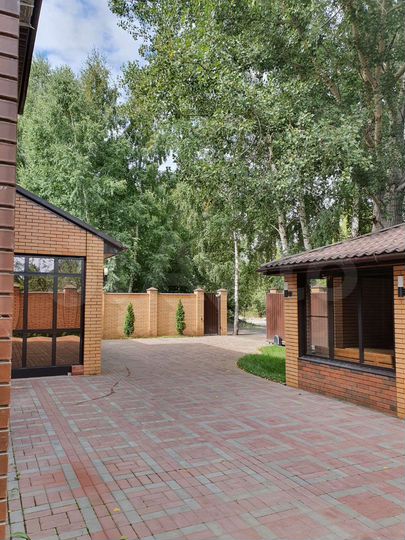 Коттедж 261 м² на участке 5 сот.