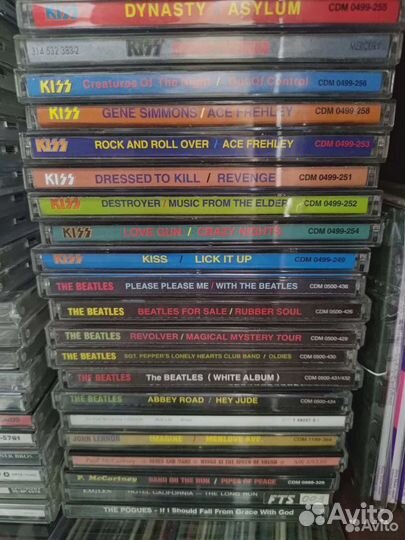 Коллекция CD дисков Beatles, Kiss, Alice Cooper