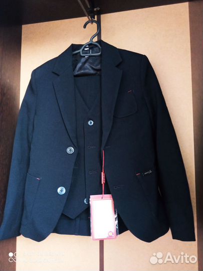 Школьный костюм для мальчика 134 новый