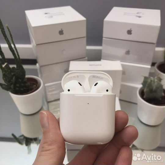 Беспроводные наушники Apple