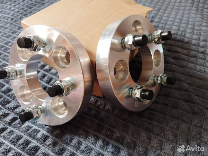 Колесные проставки 4х100