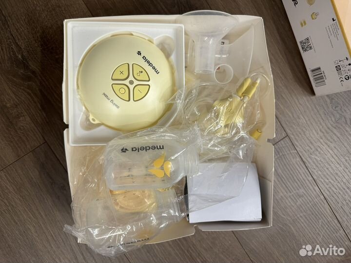 Молокоотсос medela swing maxi flex