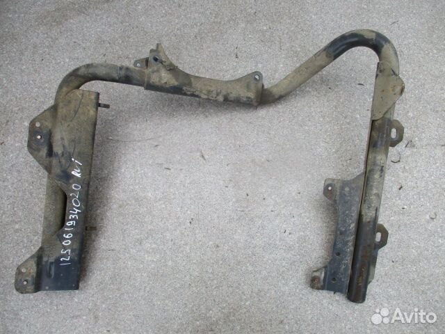 Кронштейн переднего крыла левый renault 7420930495