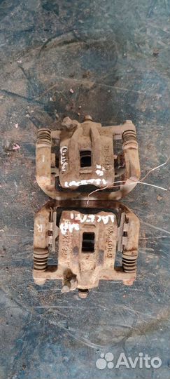 Суппорт тормозной задний Chevrolet Lacetti