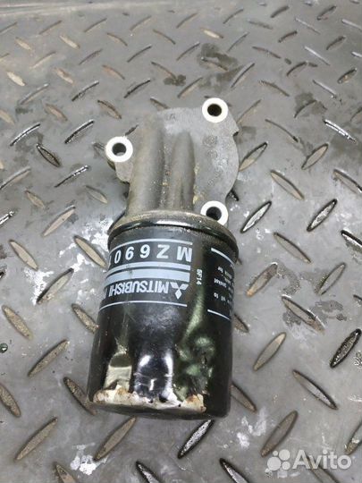 Кронштейн масляного фильтра Mitsubishi Lancer 10