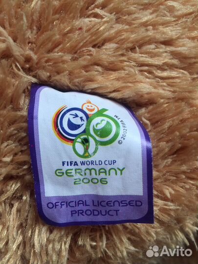 Лев Голео и мяч Пилле талисман чм мира по футболу