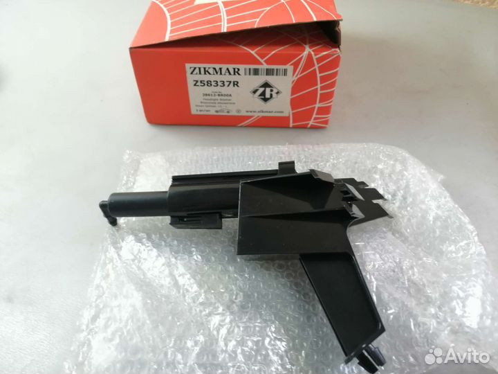 Форсунка омывателя фар левая Nissan Qashqai J10