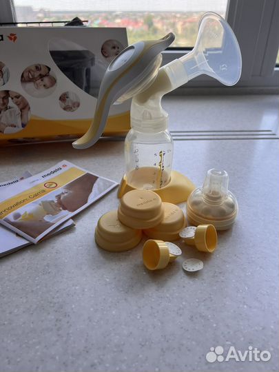 Молокоотсос medela ручной