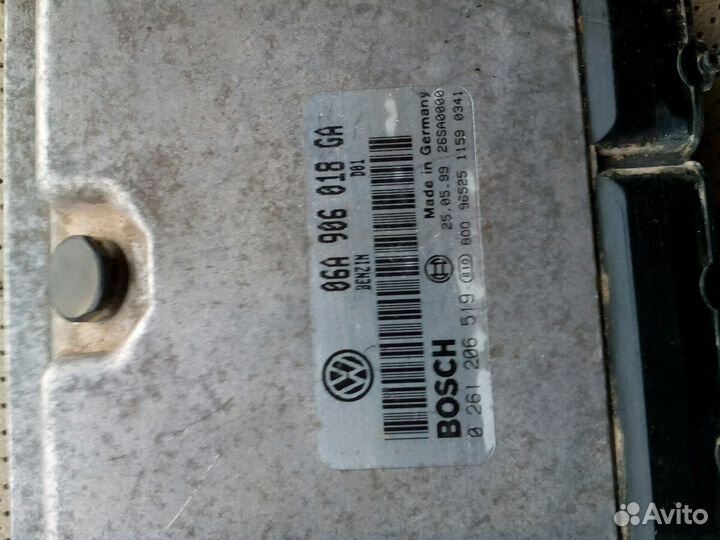 Блок управления двигателем 06A906018GA