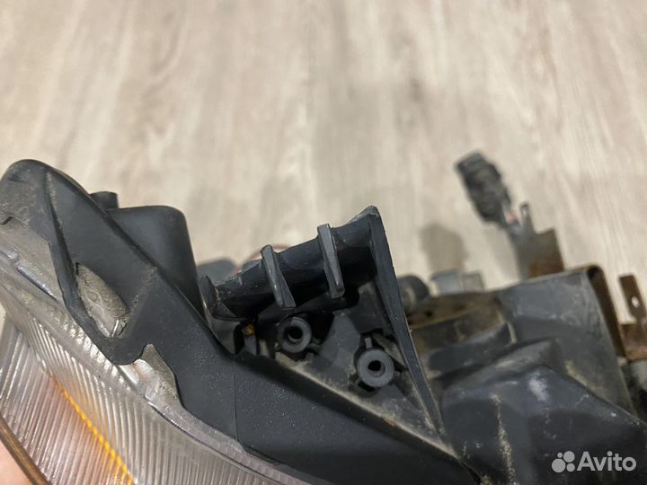 Фара левая передняя Mitsubishi lancer X