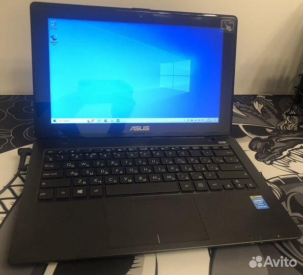 Ноутбук asus X200M
