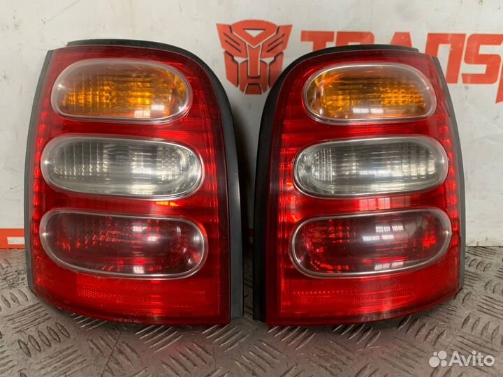 Фонарь задний правый Ниссан Марч К11