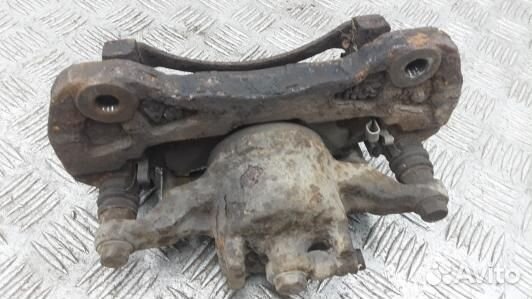 Суппорт тормозной передний правый mitsubishi L200