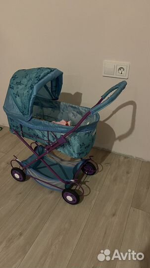Игрушечная детская коляска