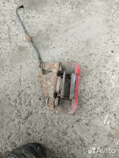 Суппорт тормозной передний правый Kia Pio 1