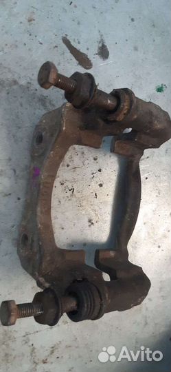 Скоба супорта рено логан